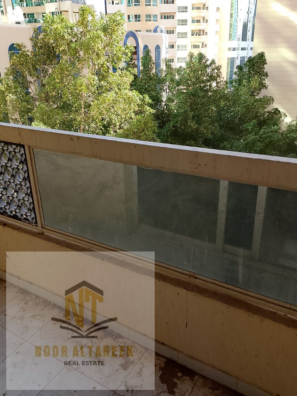 Annual Apartment for Rent – Al Majaz 2 Noor Al Tareeq Real Estate offers a well-maintained apartment for annual rent in Al Majaz 2, located in a live