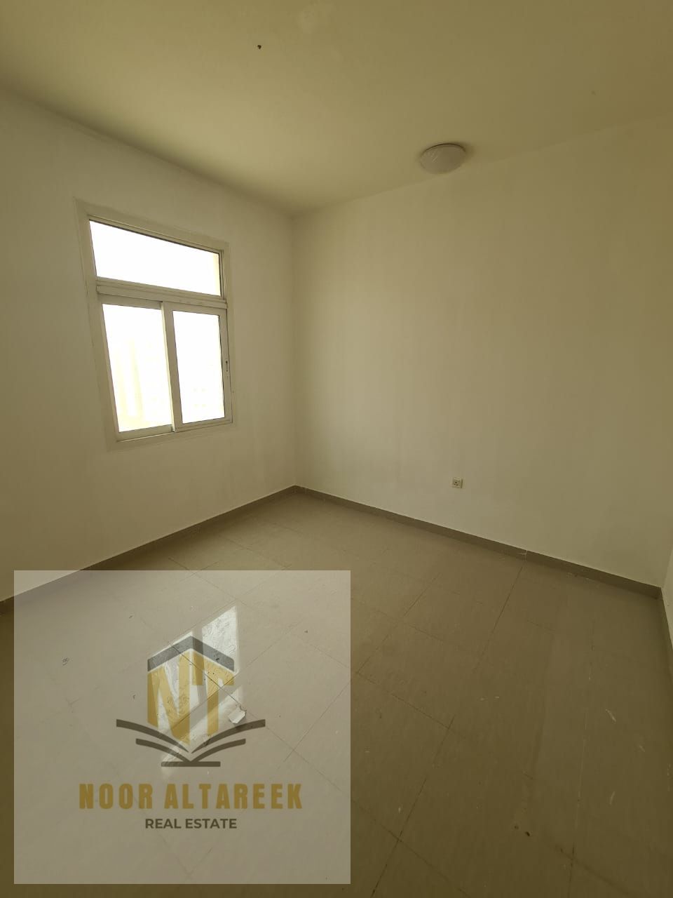 is pleased to offer a distinguished yearly rental apartment in Al Boutina, located in a lively area close to all essential services and facilities su