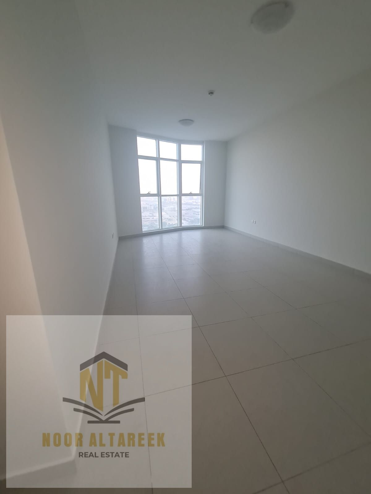 A distinguished apartment is available for annual rent in Al Taawun, located in a vibrant area close to all esse and se ntial facilities
