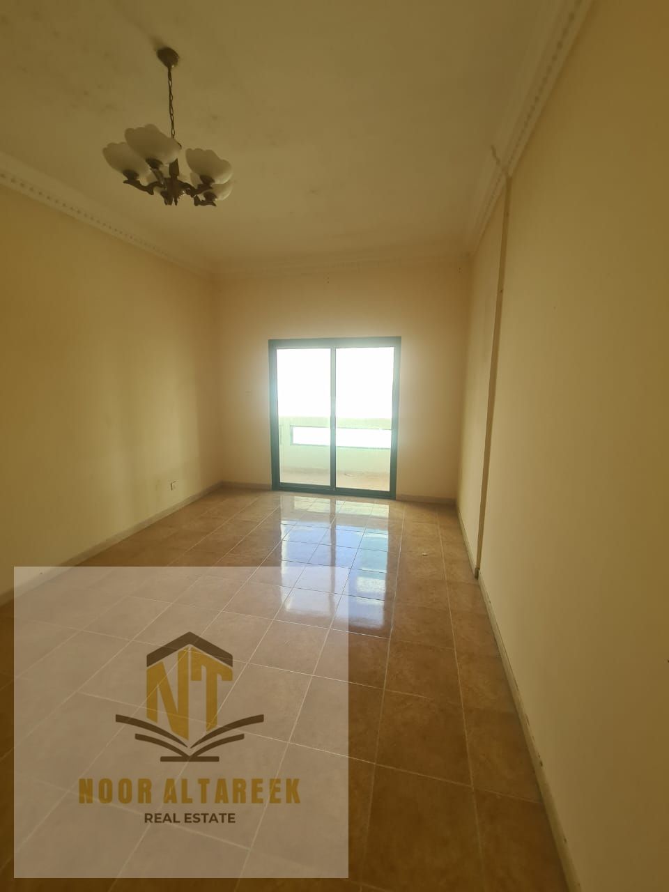 Location: Sharjah, Al Mahatta area. Specifications: Master bedroom, living room, two bathrooms, and balcony.