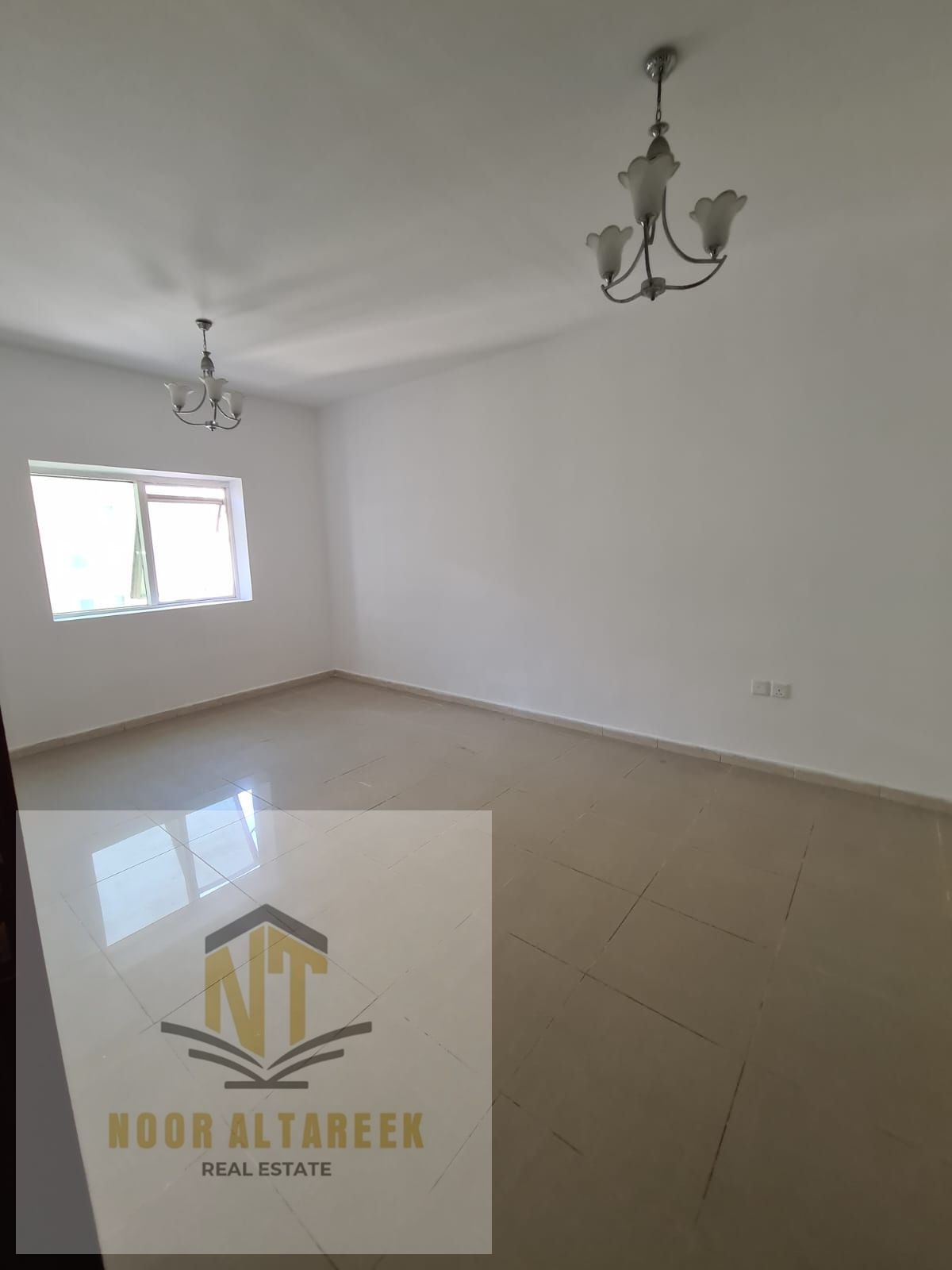 Apartment for rent in Al Taawun, Sharjah, located in a prime area close to schools, shopping centers, restaurants, and public transportation. The apar