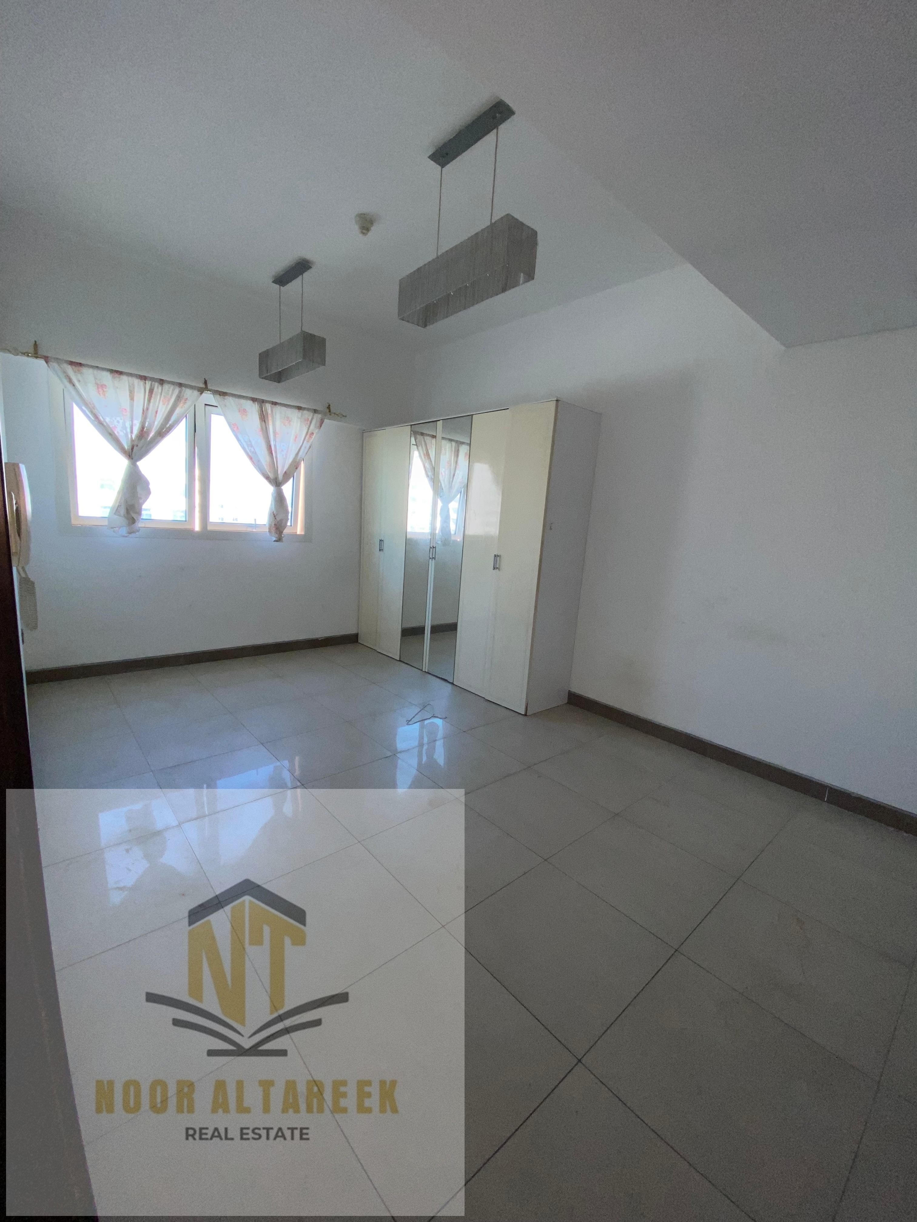 Distinctive apartment for rent in Al Qasimia | One bedroom and living room | Built-in wardrobes / Fully equipped facilities and a prime location