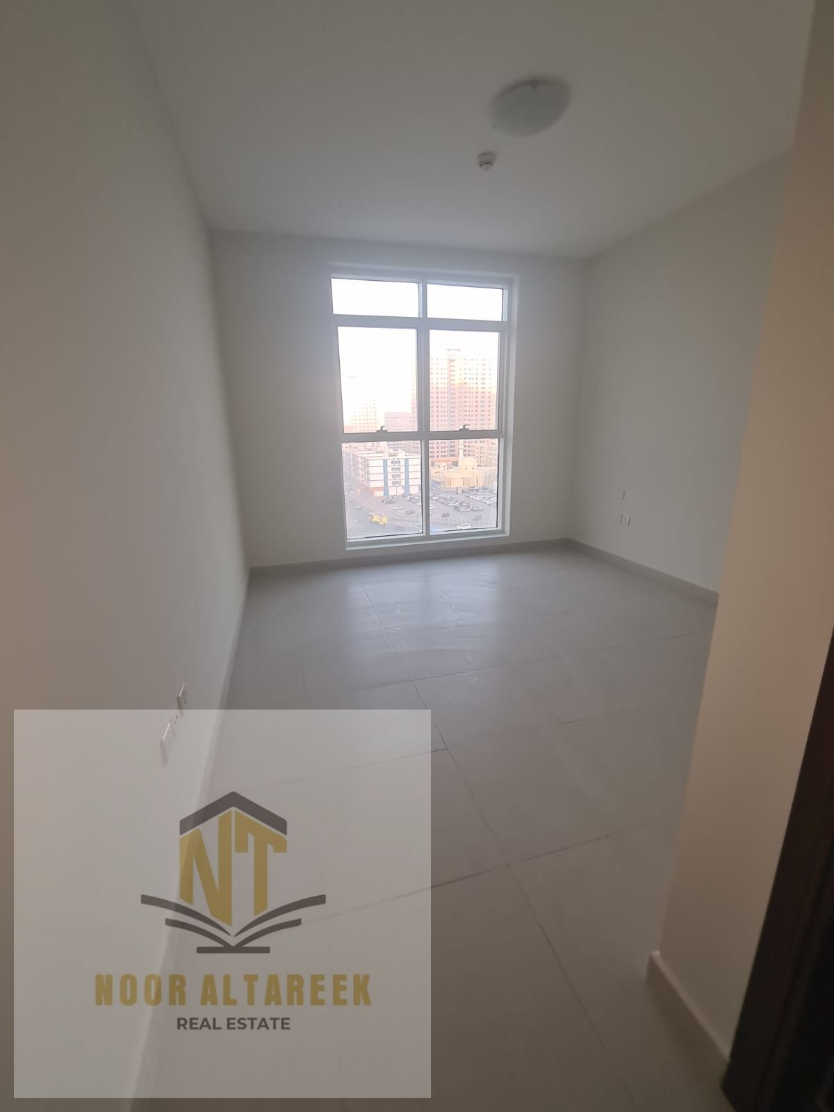 Apartment for rent in Al Taawun area with a prime location close to all essential services