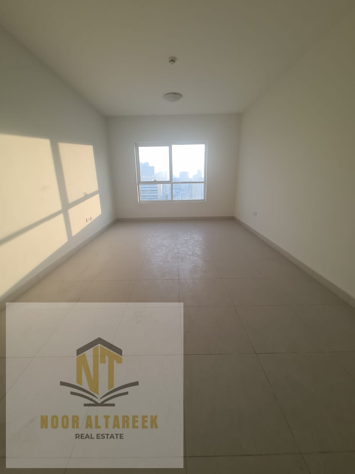 Spacious apartment for rent in Al Taawun,