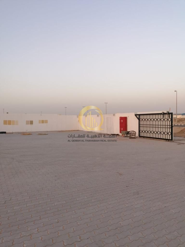 For sale: a plot in the UAE Industrial City in Sajaa, on Street 97. Plot area: 28,000 sq. ft.