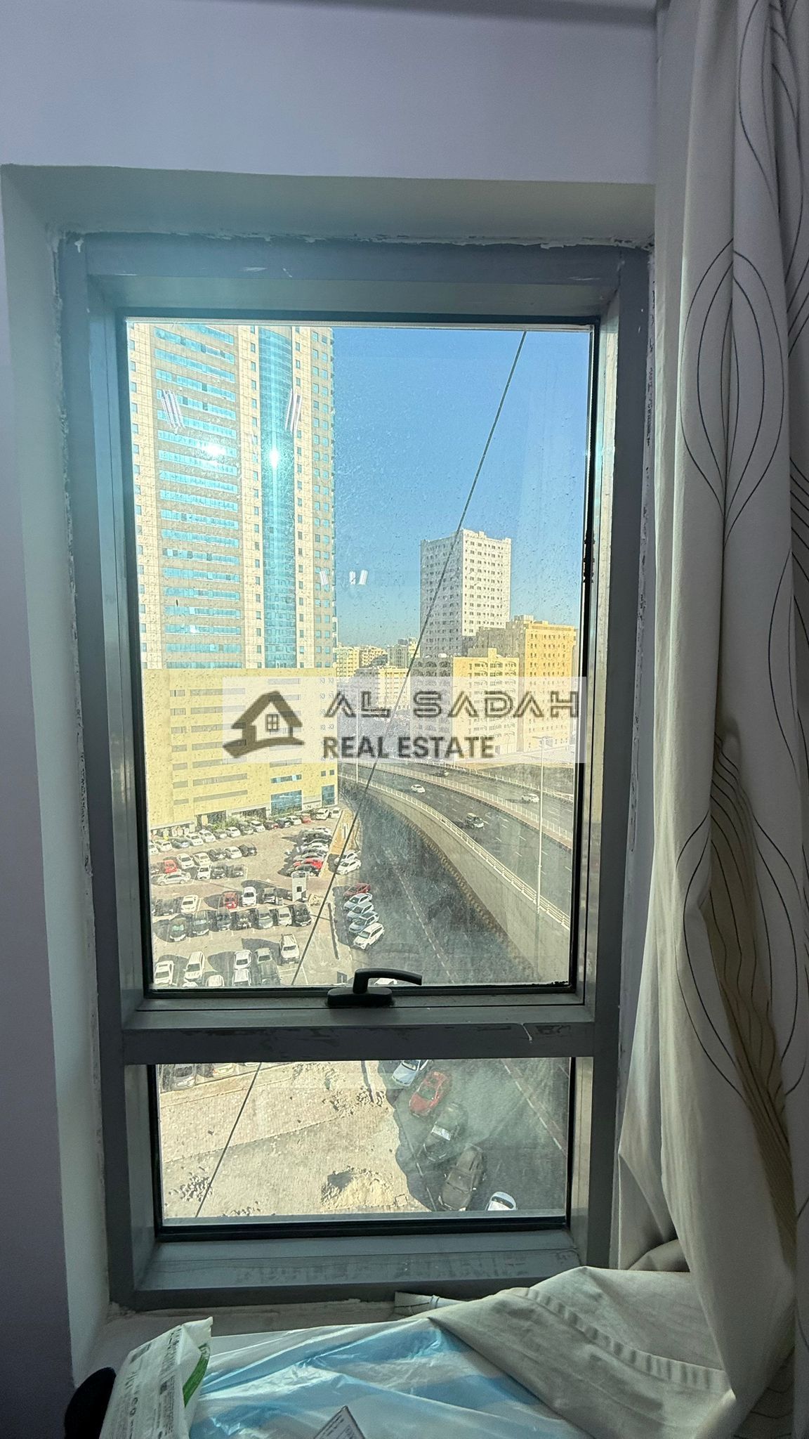 Apartments for sale in Capital Tower, Al Majaz 2. Two bedrooms, living room, kitchen, three bathrooms, dining room, parking. Asking price: 600,000 (negotiable).