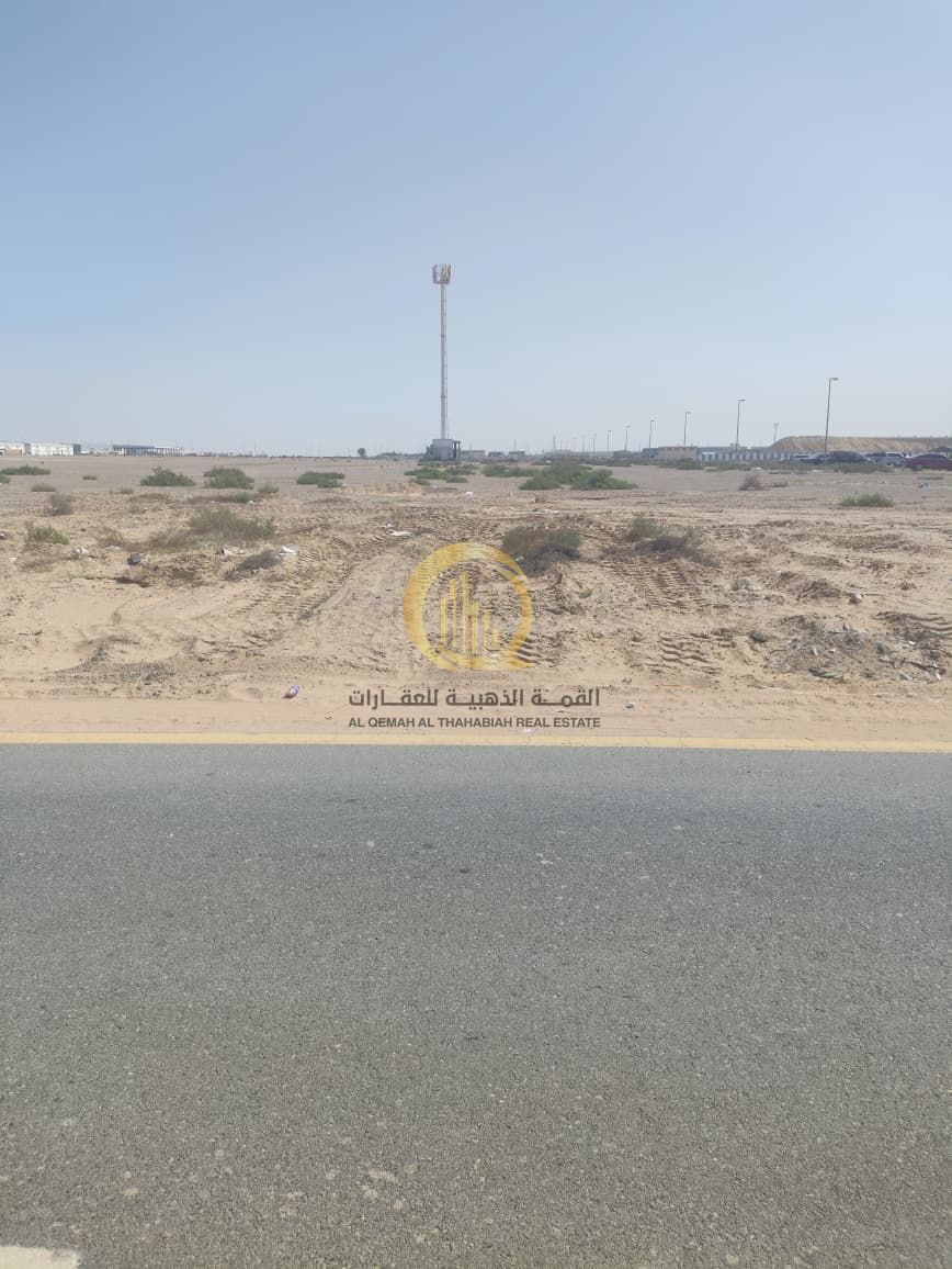 For sale: a plot of land in the Emirates Industrial City, Al-Sajaa Industrial area. Excellent location in the heart of the scrap zone. Area: 17,070