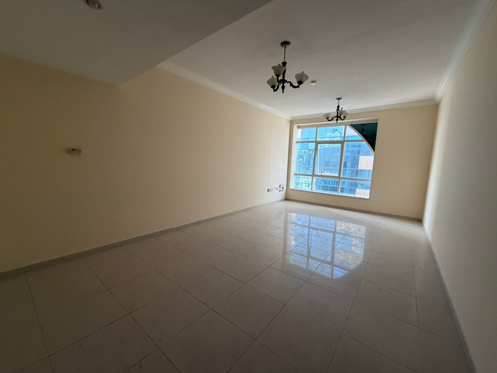 Open direct view of Al Qasba, with central AC and central gas, well distributed between rooms, and spacious areas.