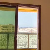 Studio apartment with separate kitchen, excellent direct view of Ajman Corniche