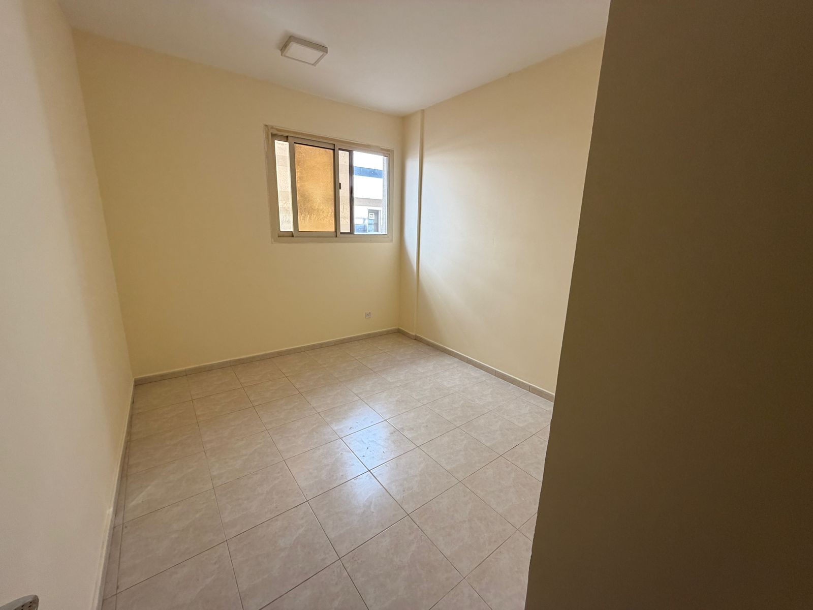 Two-bedroom apartment with a separate living room, excellent layout, large area, excellent maintenance in Al Rawda.