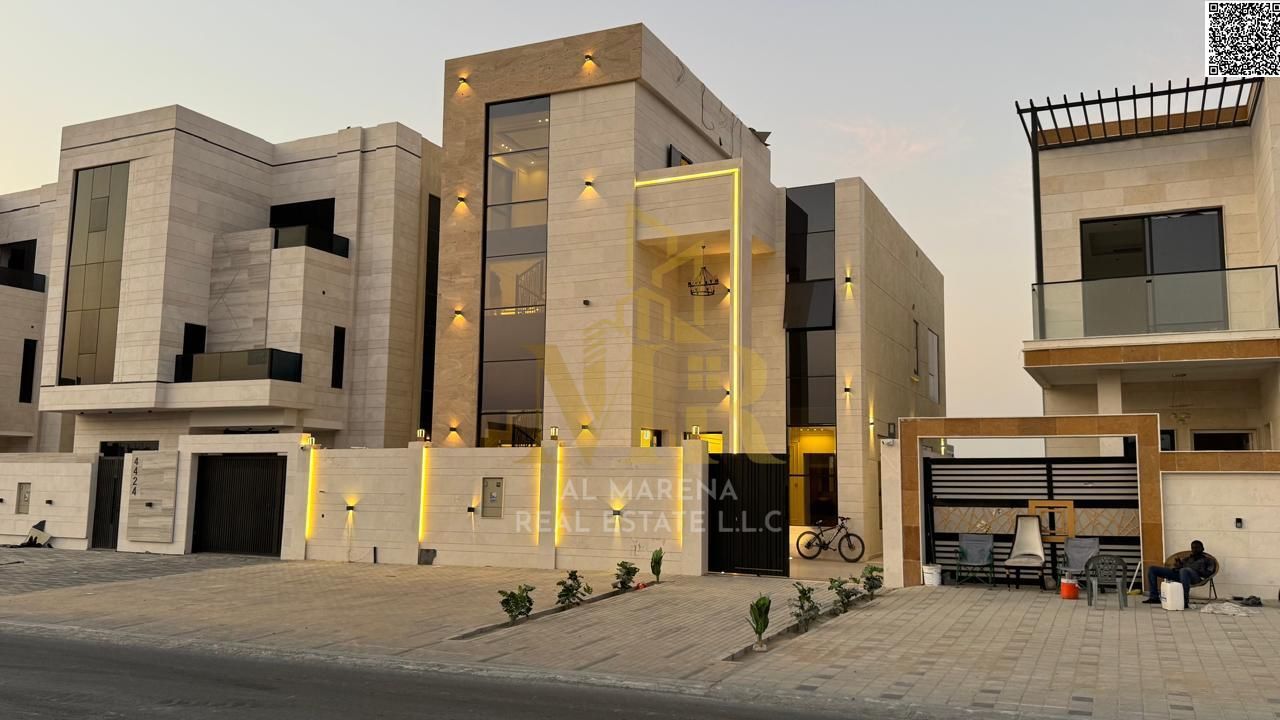 Two-story villa with a rooftop terrace, priced inclusive of registration and ownership fees, ready for immediate occupancy in one of Ajman's most pres