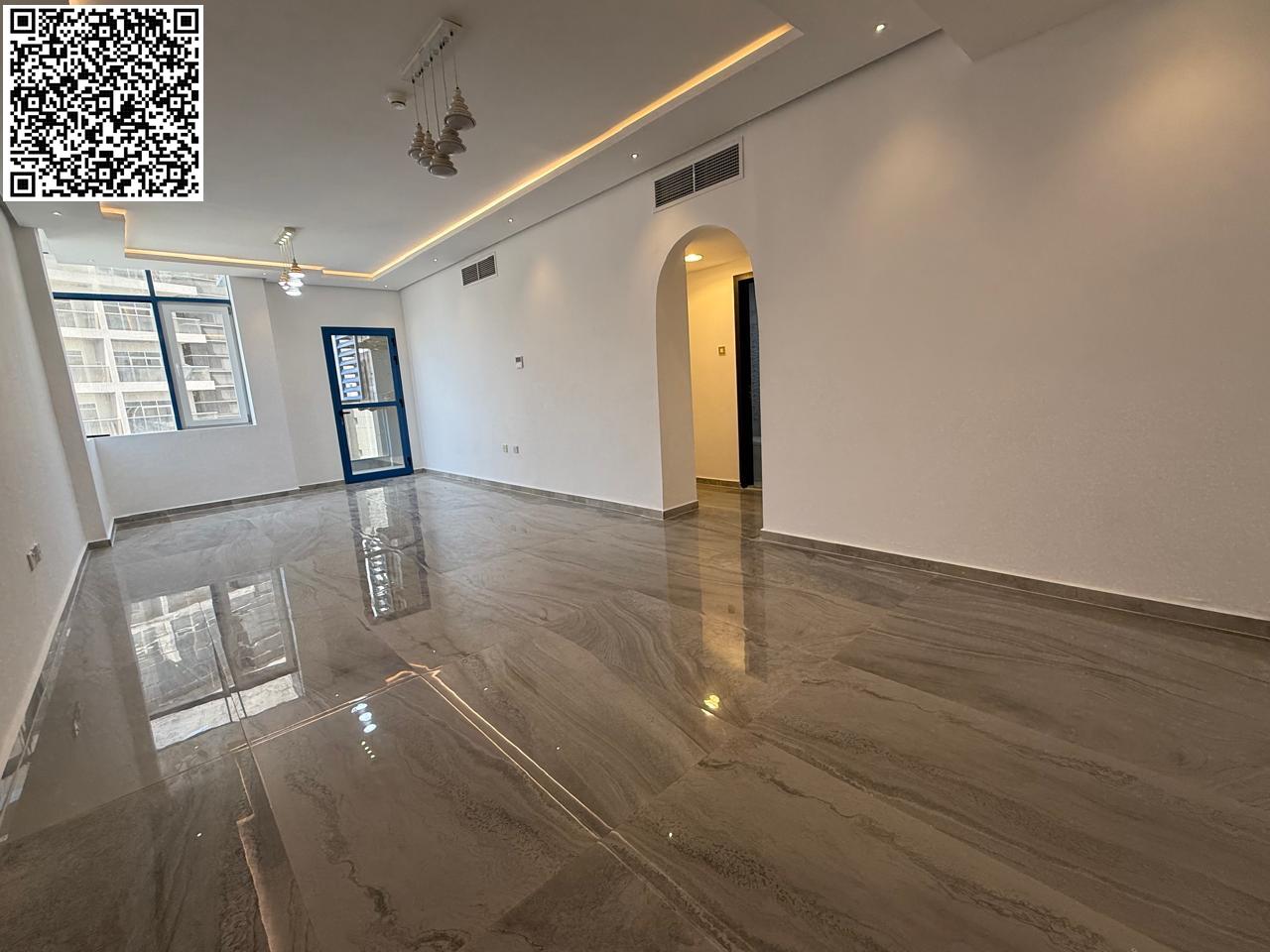 Two-bedroom apartment, first occupancy – modern design with parking and two balconies, available for annual rent. A distinctive, first-occupancy apart