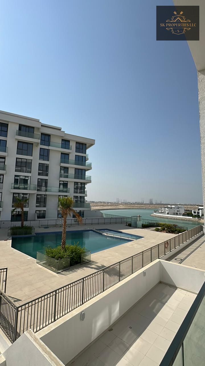 Brand New 1-Bedroom Apartment with Stunning Pool View | Ajmal Makan Waterfront, Sharjah