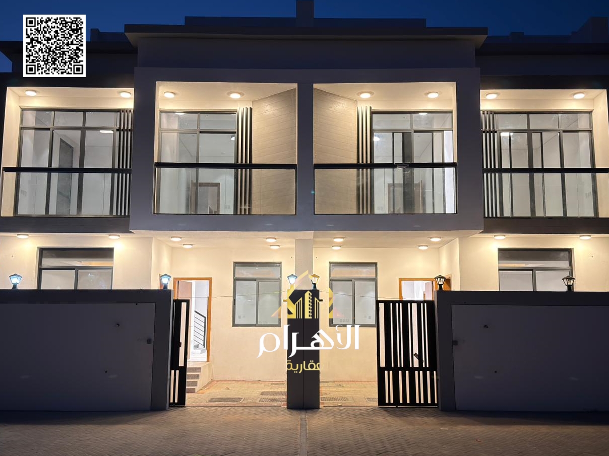 Luxury villa for sale in Al Bahia area, featuring two floors and a rooftop terrace. Modern design, spacious living areas, reception halls, and compreh