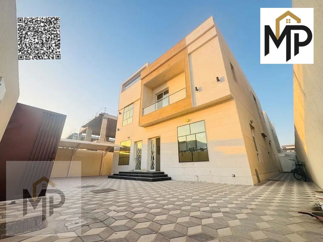 For sale in Al Amerah, Ajman, including registration fees, water, and electricity: 5 master bedrooms, a majlis, a living room, and a maid's room! Free