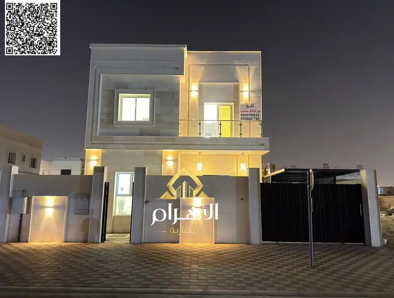 Luxury villa in Al Yasmin, Ajman, ready for immediate occupancy, featuring high-end finishes and spacious living areas. Freehold ownership available
