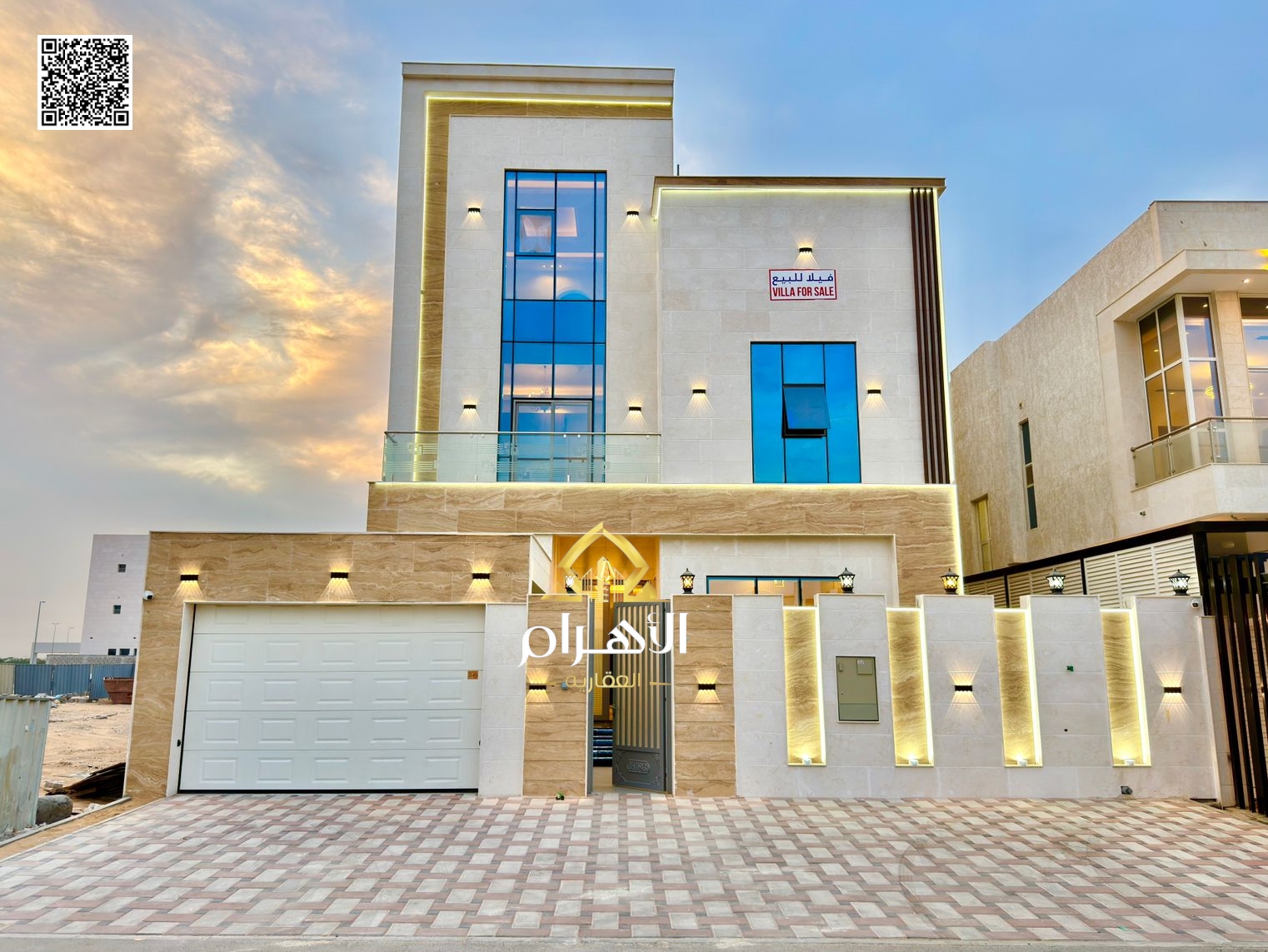 Luxury villa for sale in Al Bahia area, featuring two floors and a rooftop terrace. Modern design, spacious living areas, reception halls, and compreh