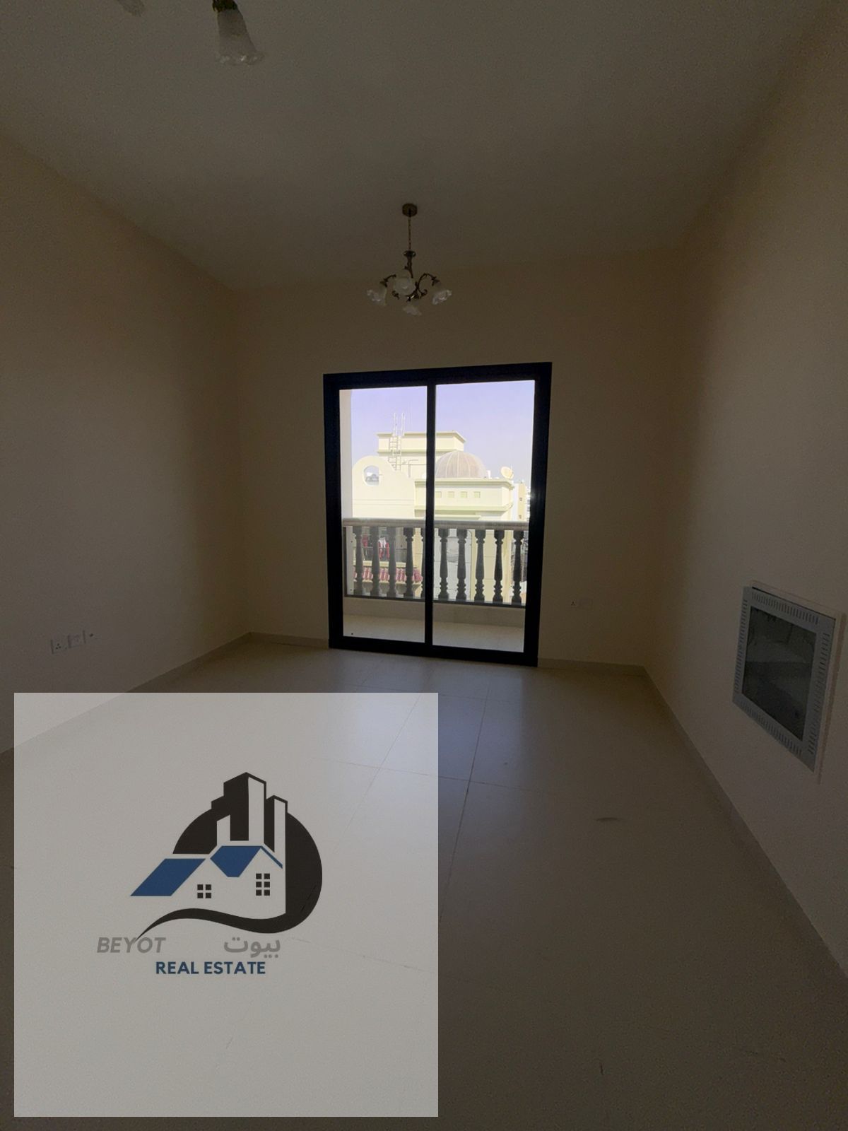 Studio apartment for rent in Ajman, first occupancy, with balcony, central air conditioning, Al Aaliyah area.