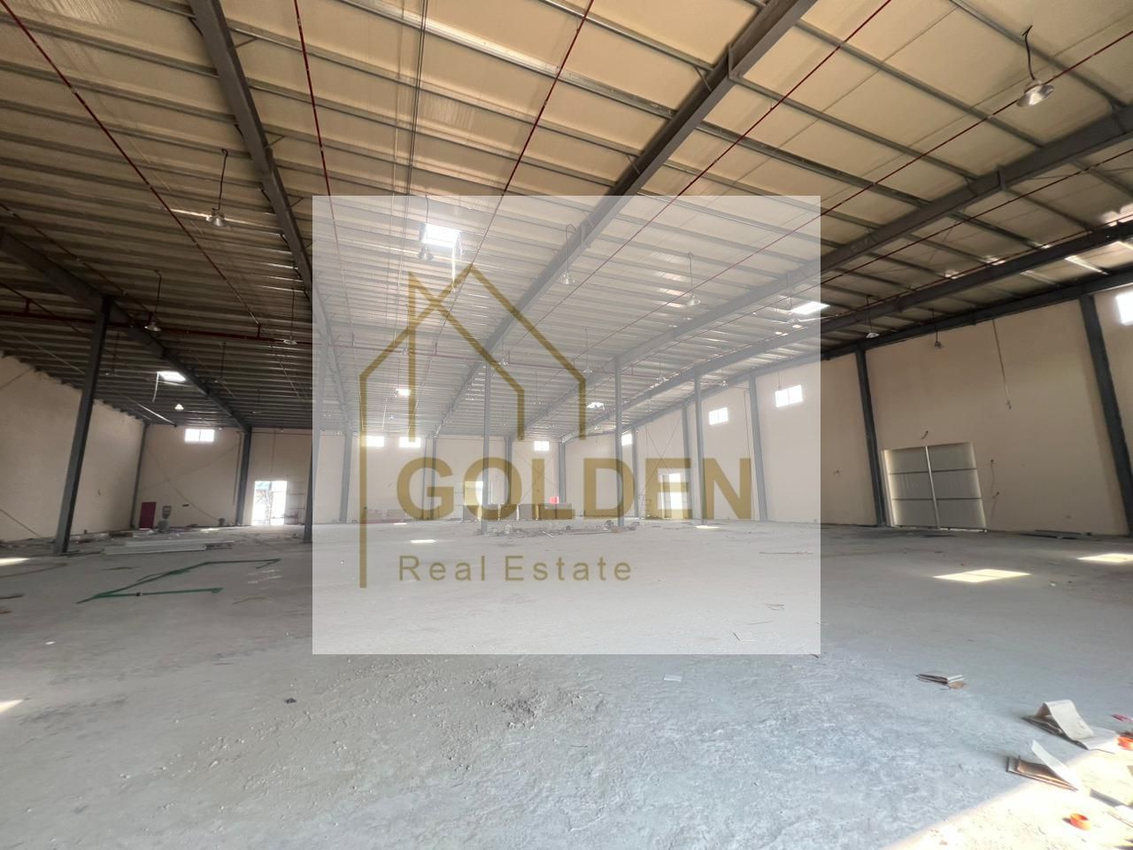 A warehouse for rent in the modern industrial area of Umm Al Quwain, ready for immediate occupancy, near the exit of Mohammed Bin Zayed Road. It boasts standard specifications and is suitable for all large-scale industrial activities or ideal storage.