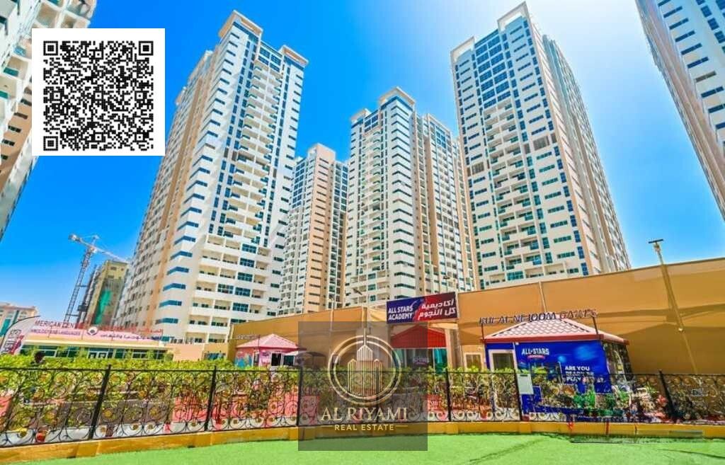 Two-bedroom apartment with master bedroom and open kitchen in Ajman One Towers