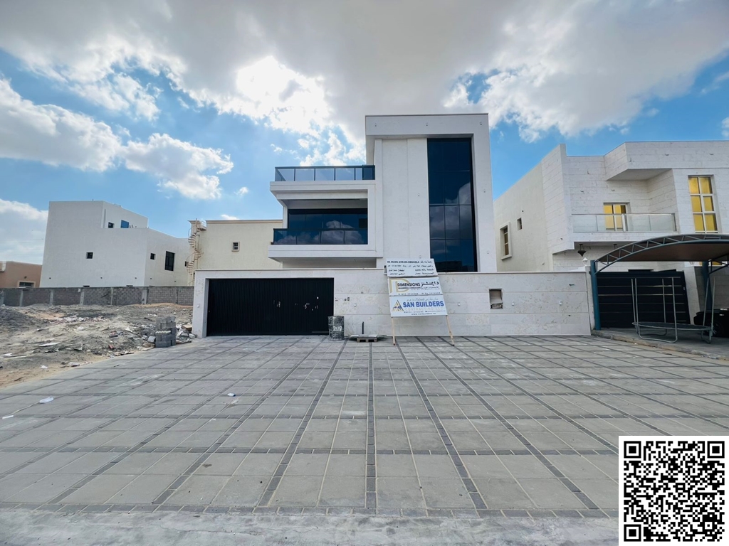 Modern villa for sale in Al Yasmeen area, Ajman. Excellent location opposite the mosque. Two floors and a roof. Includes electricity, water, and air c