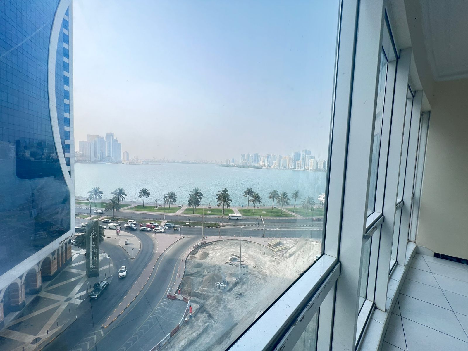 Sea view, AC on landlord, balcony, prime lively location near cafés, malls, and close to Dubai exit.
