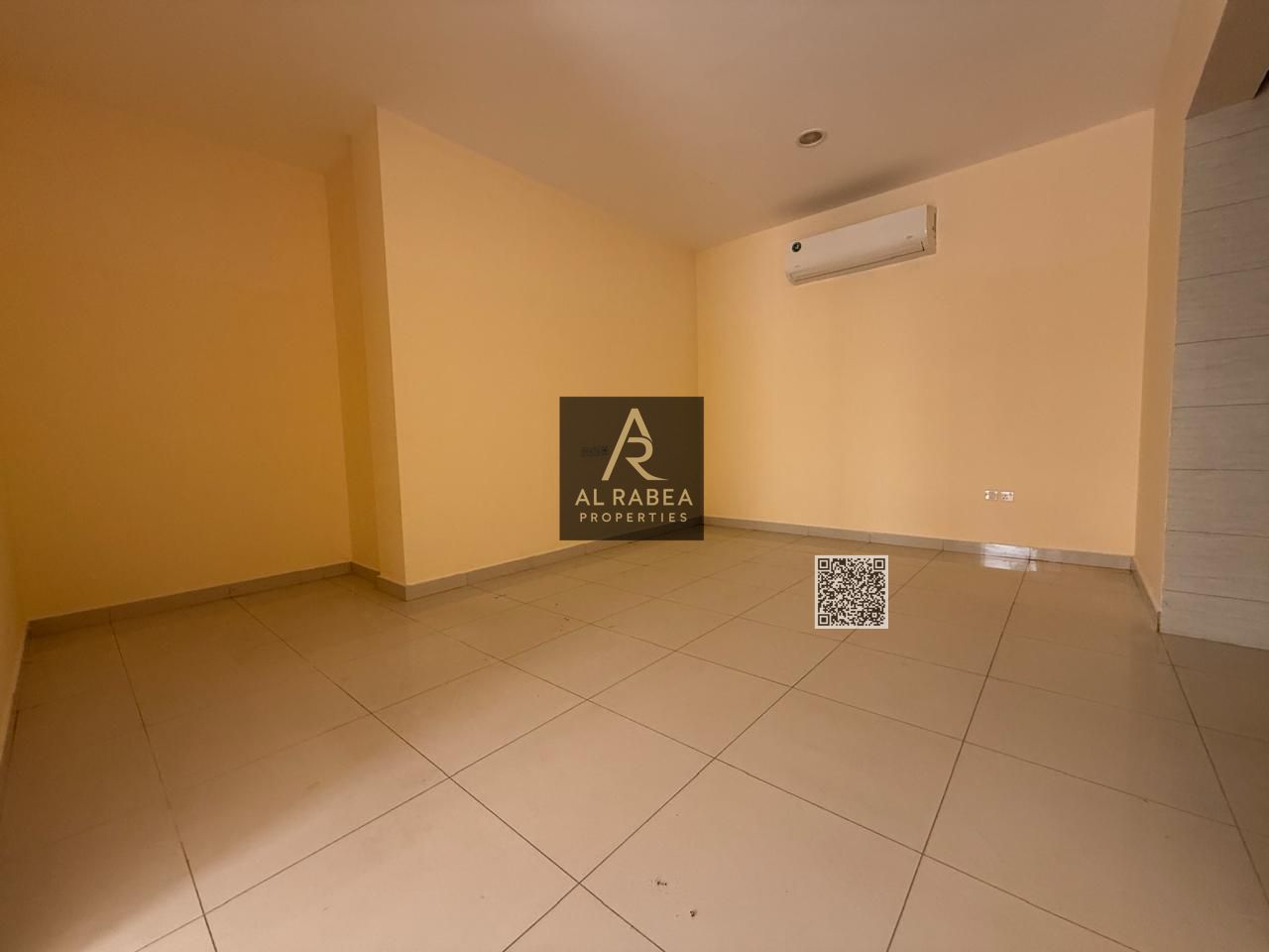 First-Occupancy Studio with Separate Kitchen and Spacious Layout for Annual Rent in Al Rawda Prime Location Near Al Hamidiya Police Station and Close
