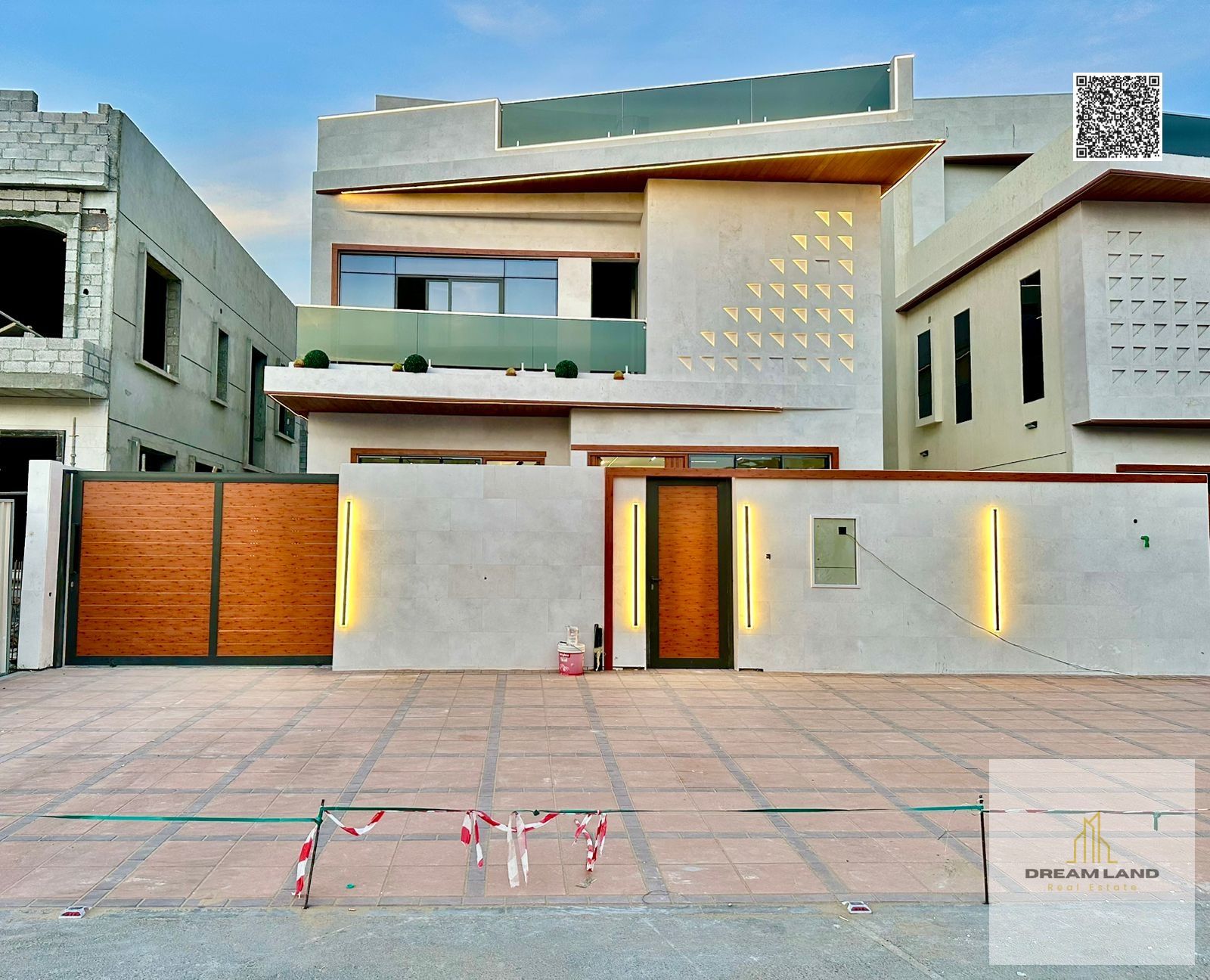 Direct from the owner, including all ownership fees: a villa in one of Ajman's most luxurious villas, built and finished to a super deluxe standard, w