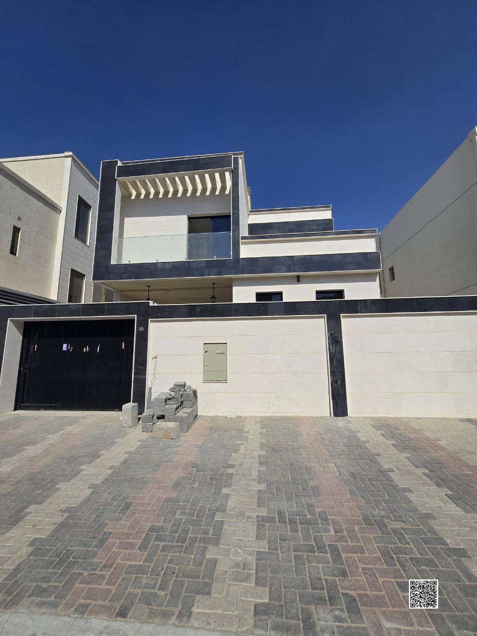 Direct from the owner, including all ownership fees: a villa in one of Ajman's most luxurious villas, built and finished to a super deluxe standard, w