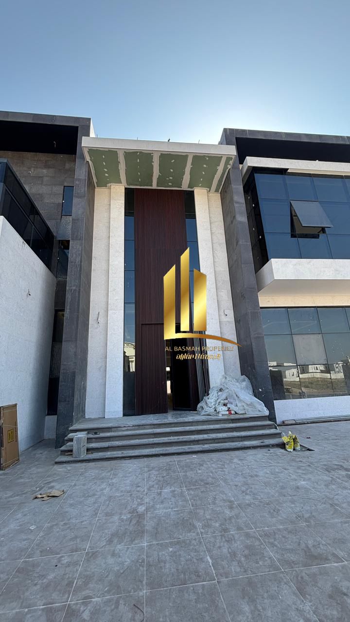For sale: Super deluxe villa in Sharjah, Al Hooshi, Al Badi'a suburb. Features include an elevator and freehold ownership for Arabs.