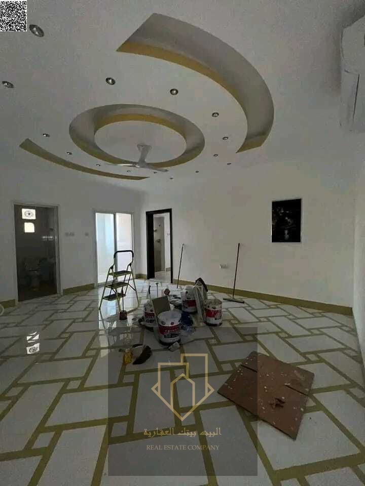 Two-bedroom apartment with a living room, 2 bathrooms, and a balcony, large space, very prime location with easy access to Dubai and Sharjah, in a new