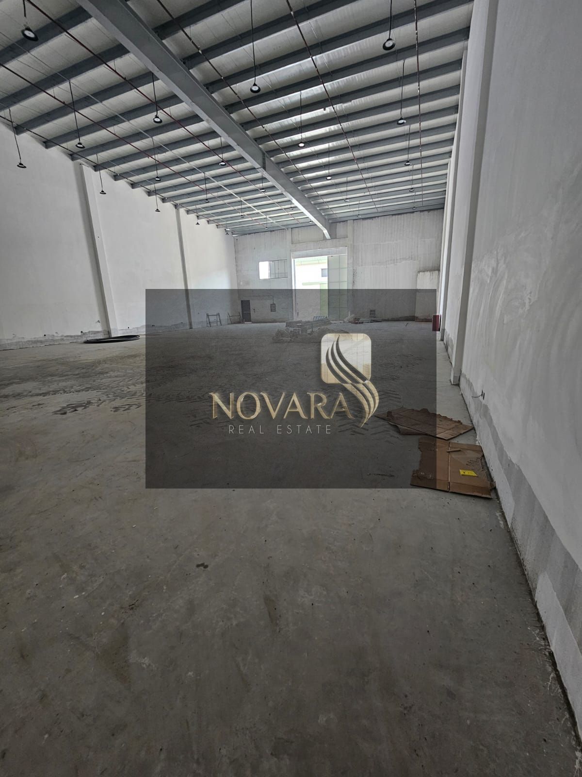 5500 sq ft warehouse on a main street in Al Jurf Industrial Area 3, 50 kW electricity, priced at 385,000. A prime location for your business.