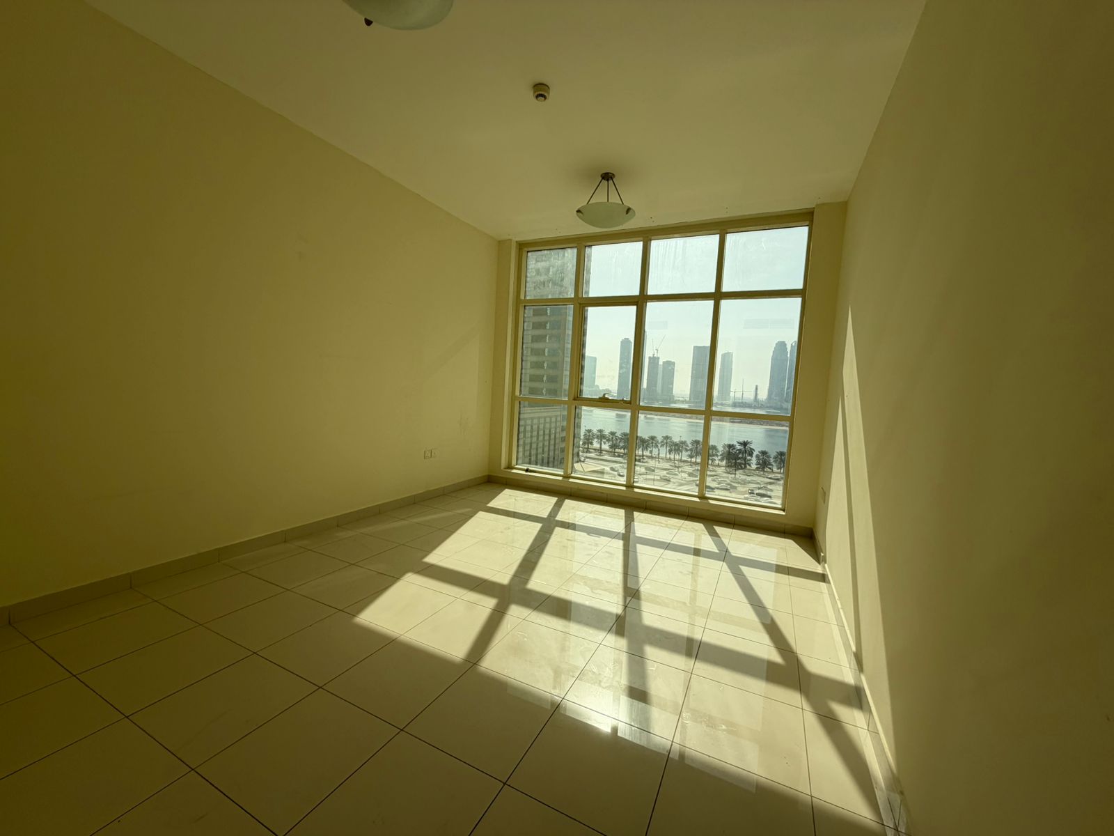 Free parking, gym & pool + sea view for rooms & hall, all master rooms, built-in wardrobes, maid room & kids area, prime location near malls & cafes.