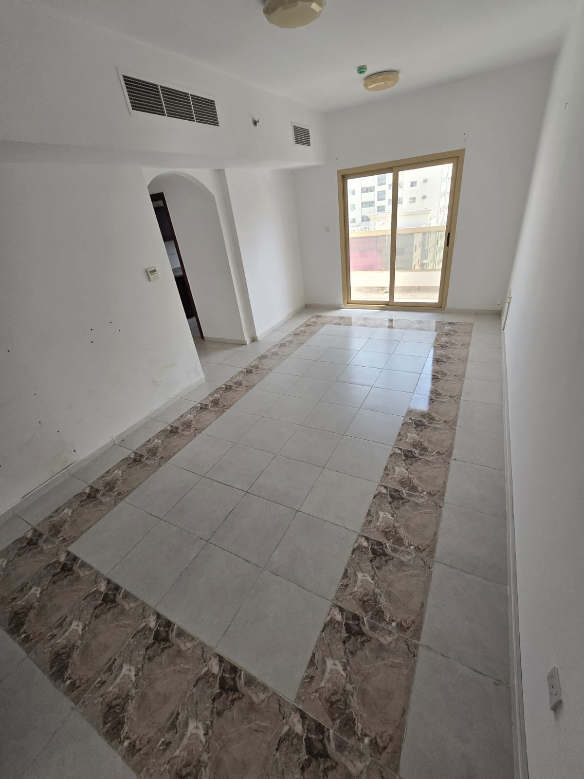 Apartment for rent in Al Qasimiya Land three bedrooms and living room very large area three bathrooms balcony central AC price 52000 in four payments