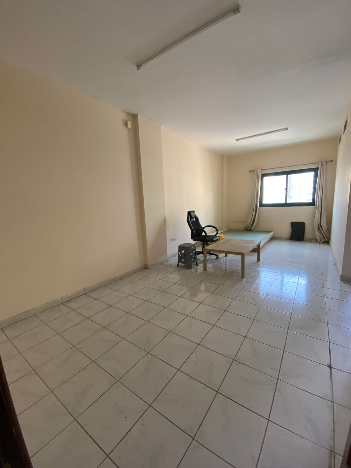 Studio apartment in Al Majaz 2, larger area, separate kitchen and open balcony, payment facilities and one month's security deposit deferral.