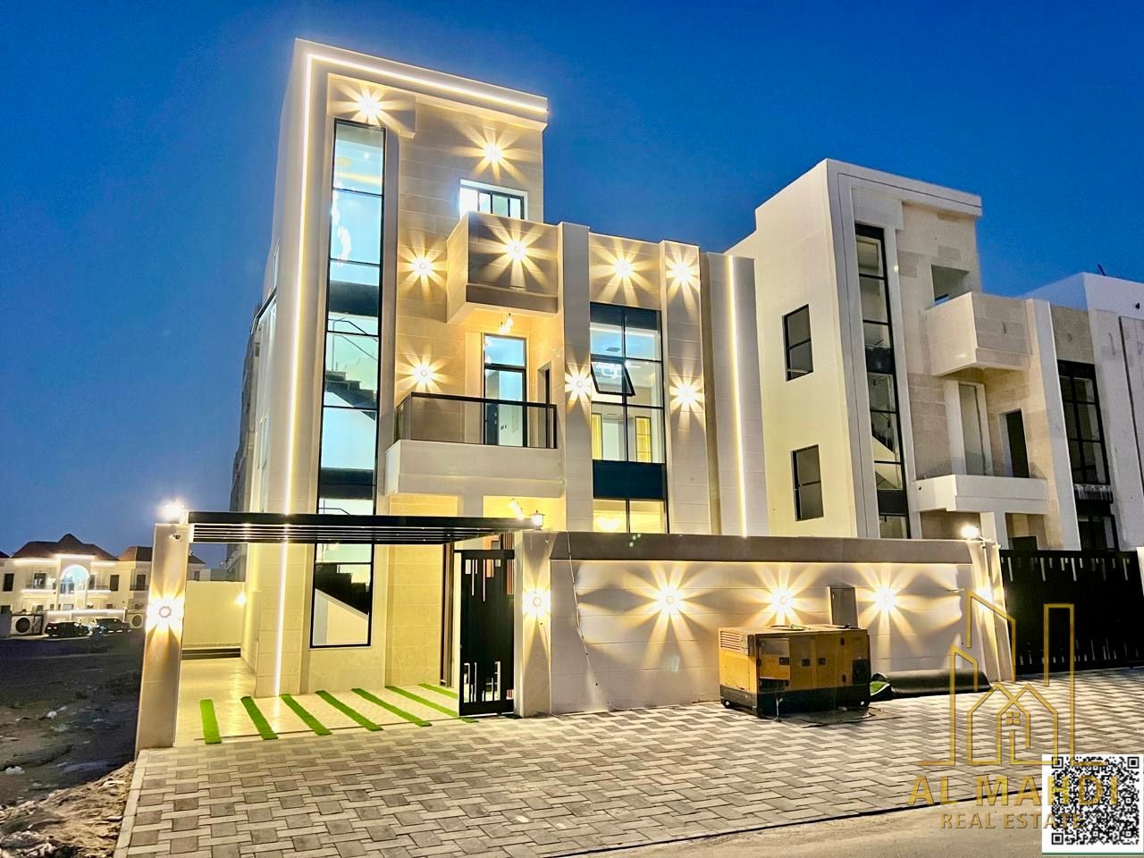 Direct from the owner, including all ownership fees: a villa in one of Ajman's most luxurious villas, built and finished to a super deluxe standard, w