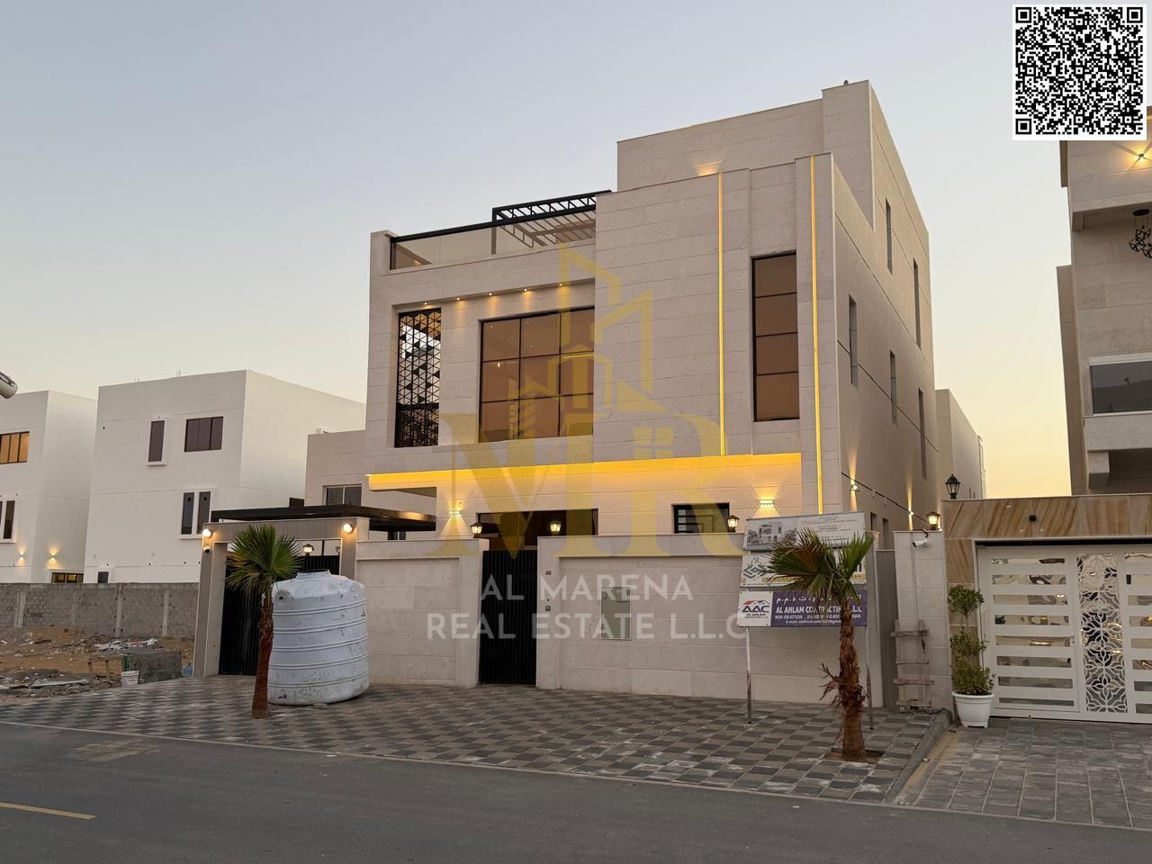 Luxury villa for sale in Al Bahia, Ajman, with a swimming pool, majlis, and living room. A great opportunity at a price that includes registration fee