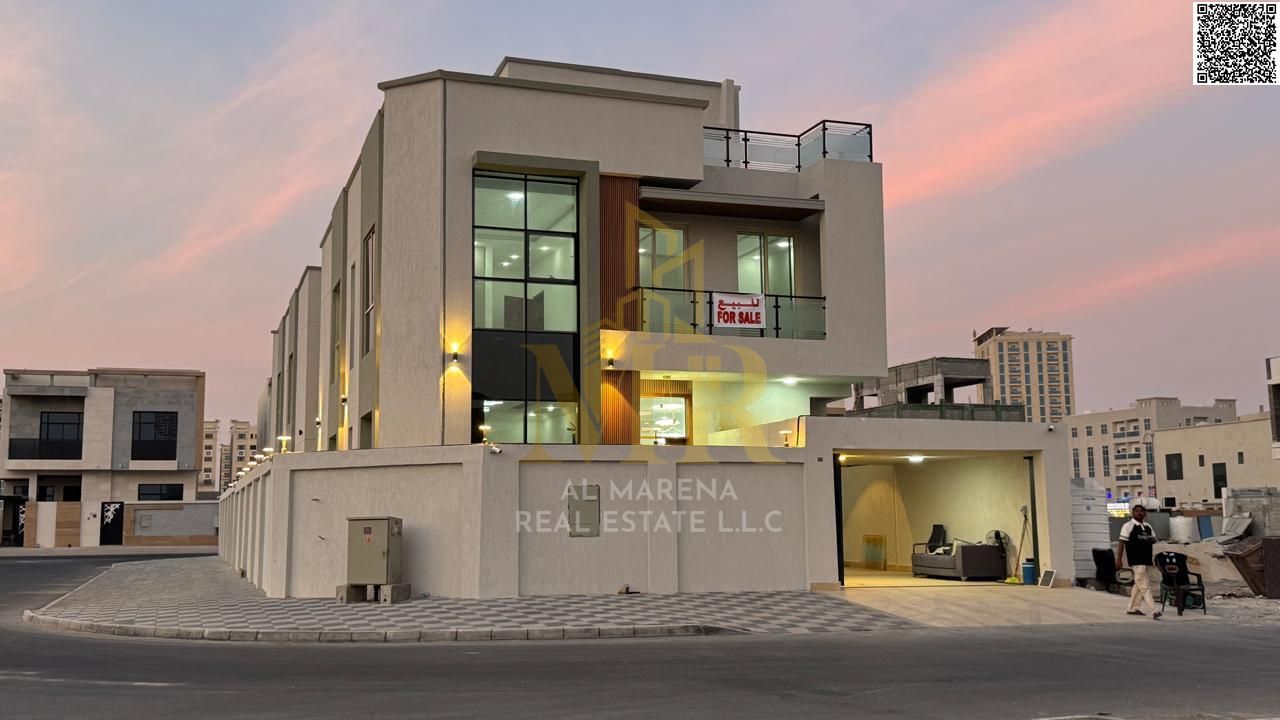 For sale in Al Yasmin, a corner villa with two floors and a roof, 6 rooms, a majlis, a living room with a spacious kitchen and a maid's room