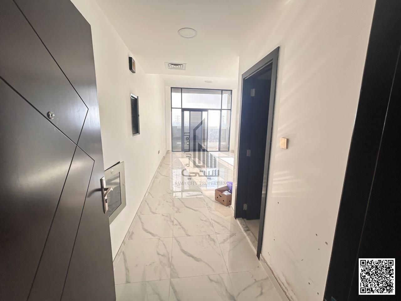 Two-bedroom apartment with a living room and three bathrooms for rent in Al Muwaihat 2.