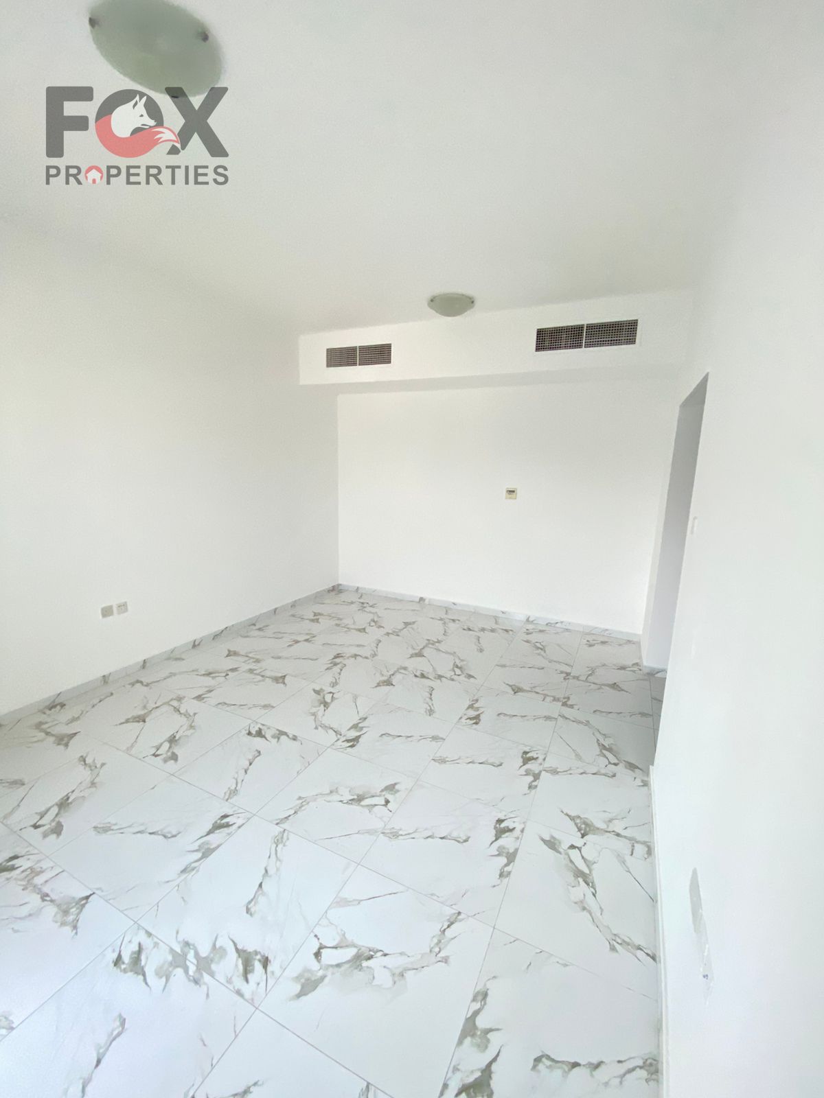 For annual rent in Ajman, Al Rashidiya 2 area, opposite the Ladies' Park: Two bedrooms and a living room