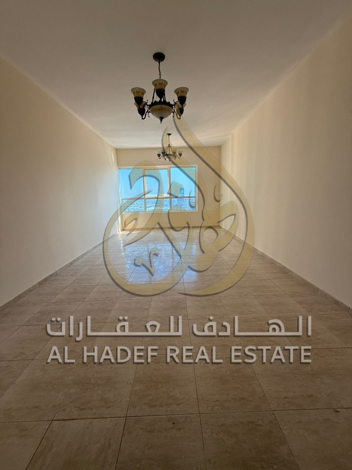 Spacious 2-bedroom apartment with a living room in Al Taawun, offering an excellent layout and comfortable living space. Private parking space incl