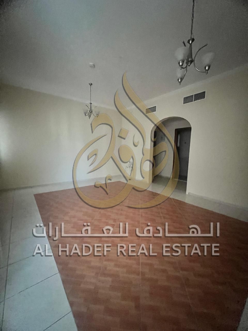2-bedroom apartment available in Al Qasimia Al Nad, free AC, free parking and one free month, 4 cheques, prime location near all services.
