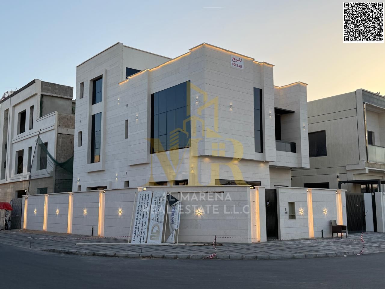 Luxury villa for sale in Al Yasmin, Ajman. Corner unit, two floors and roof. Majlis and living room. Price includes electricity, water and air conditi