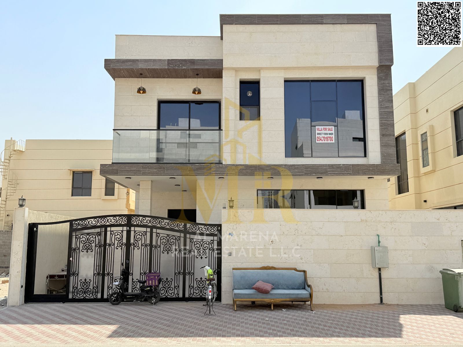 Luxury villa for sale in Al Yasmin, Ajman. 5 master bedrooms, large living room, modern kitchen. First floor. Price includes all services.