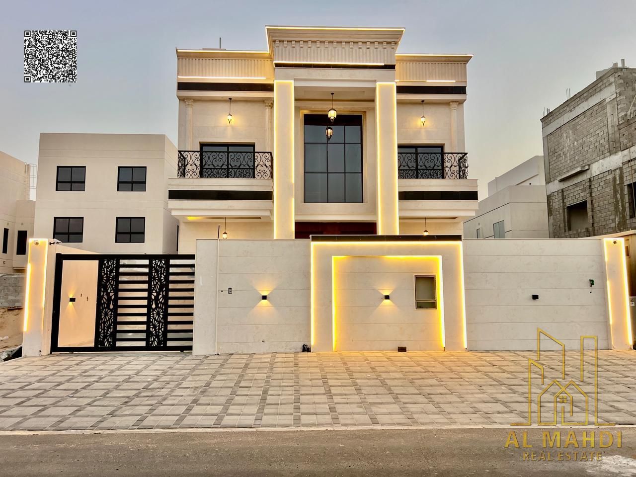 Luxury villa for sale in one of Ajman's best areas, including water, electricity, and air conditioning - featuring a luxurious modern design - freehol