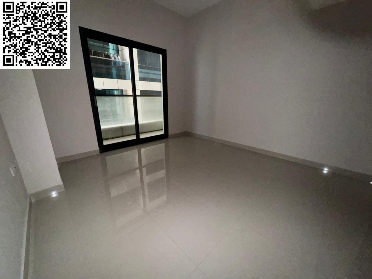 Modern 2BR apartment for annual rent in Al Rashidiya 1 Ajman with master bedroom, balcony, built-in wardrobes, spacious hall, parking, and prime fami