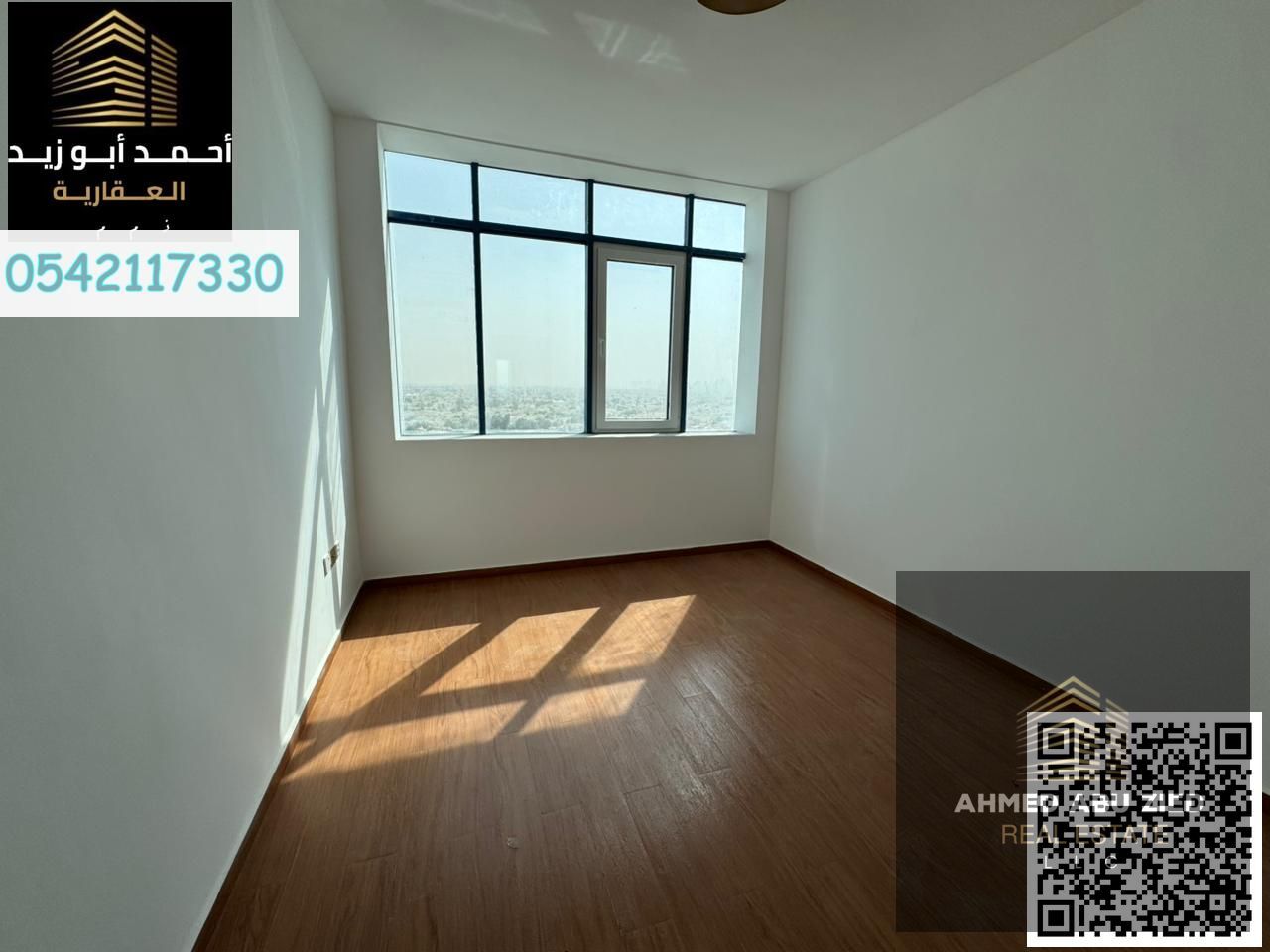 Spacious 1BR + Hall for annual rent, first occupancy in Al Nuaimiyah 3, Ajman – equipped kitchen, free maintenance, prime location, 43,000 AED.