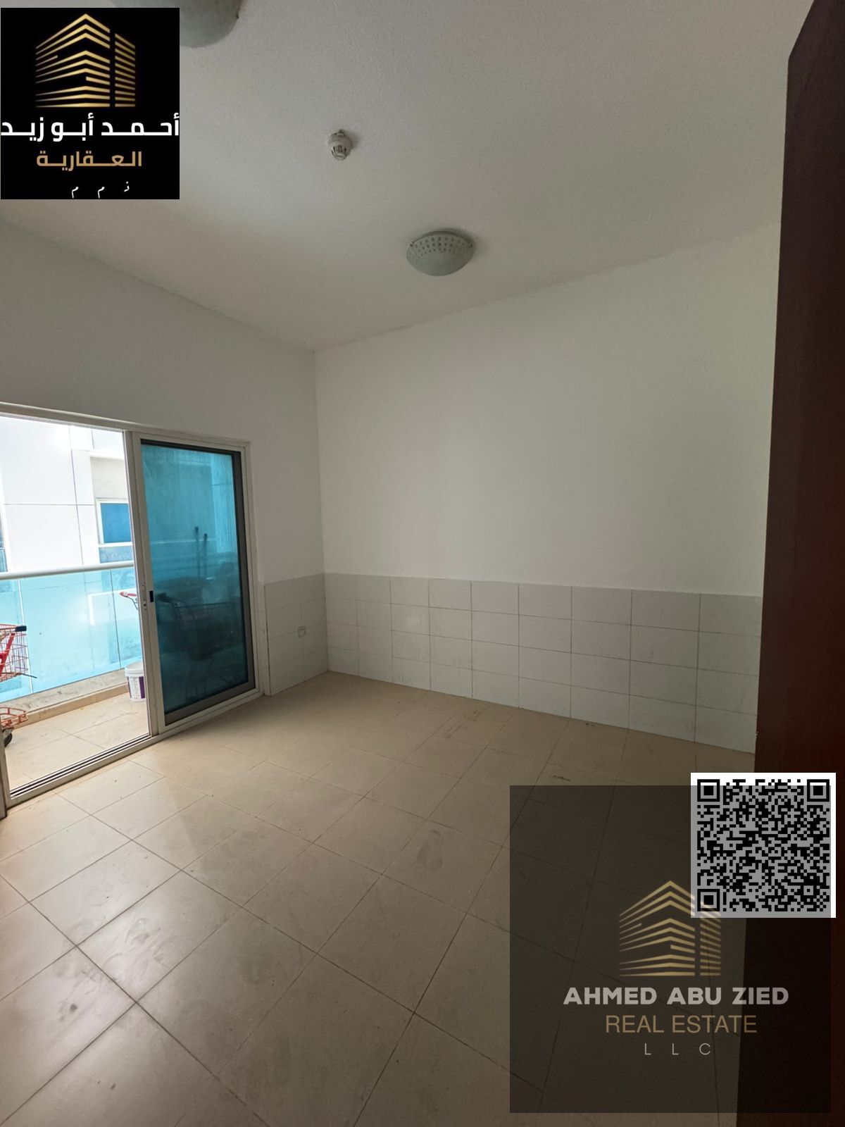 1BHK for rent in City Towers Ajman opposite Grand Mall, 2 baths, balcony, prime mall location, AED 28K, 4 payments.