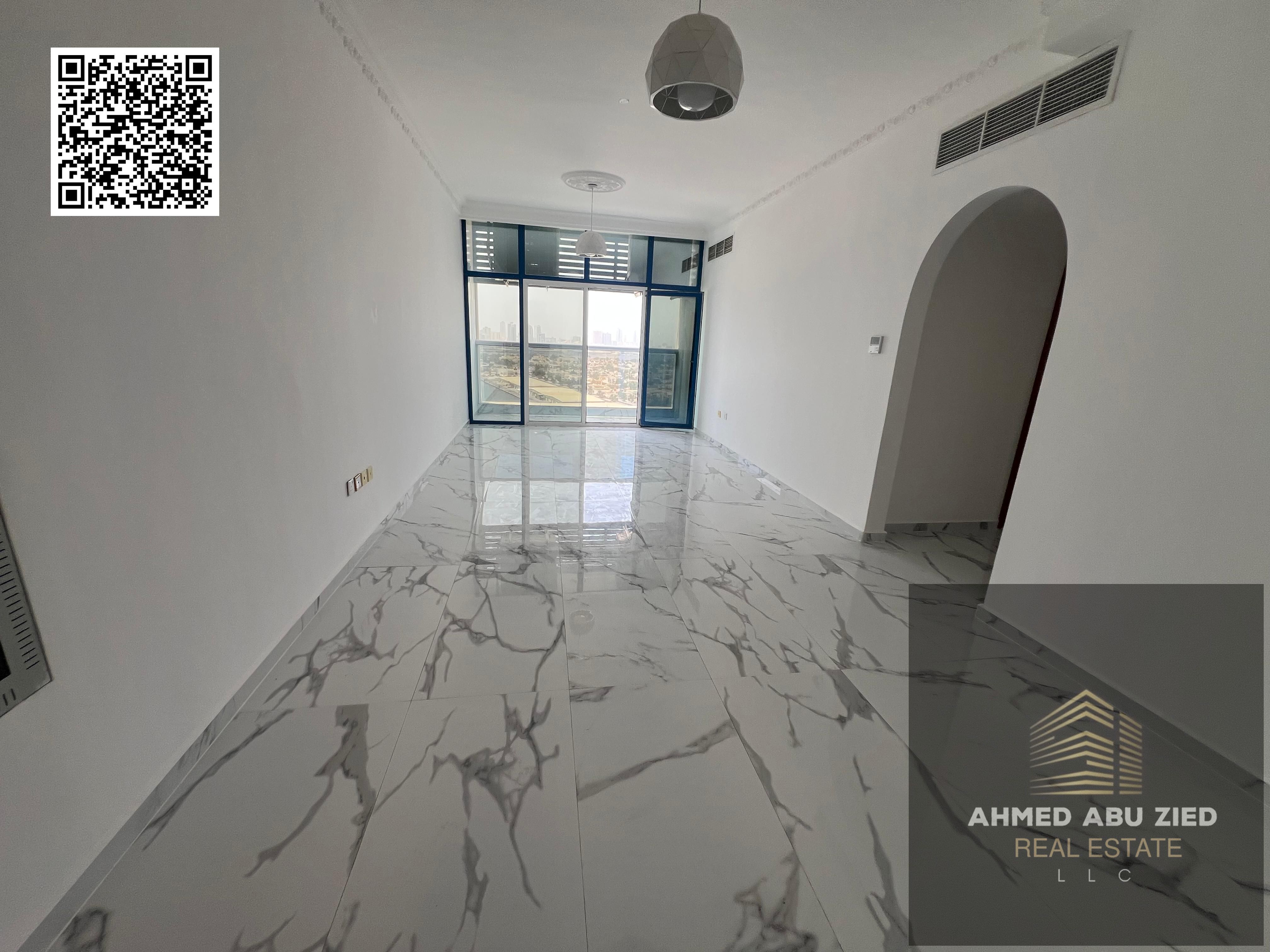 Luxurious two-bedroom apartment with a living room and open sea view for annual rent in Mushrif, next to City Centre Ajman and Dubai exits