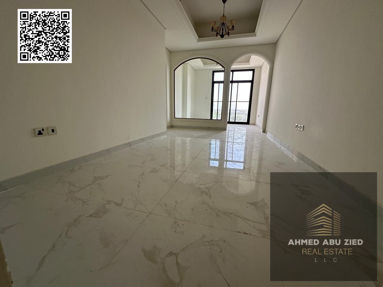 Luxurious three-bedroom apartment with a living room and a swimming pool, brand new, for annual rent in Al Muwaihat 3, directly on the main road.